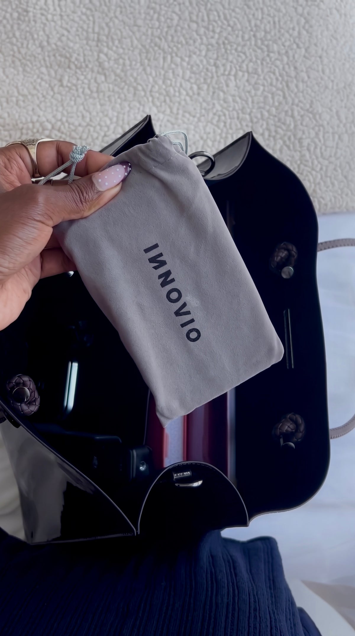 Folded Flexi Go going into a bag